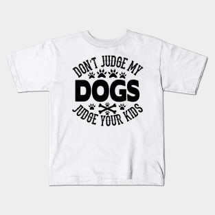 Don't judge my dogs judge your kids Kids T-Shirt
